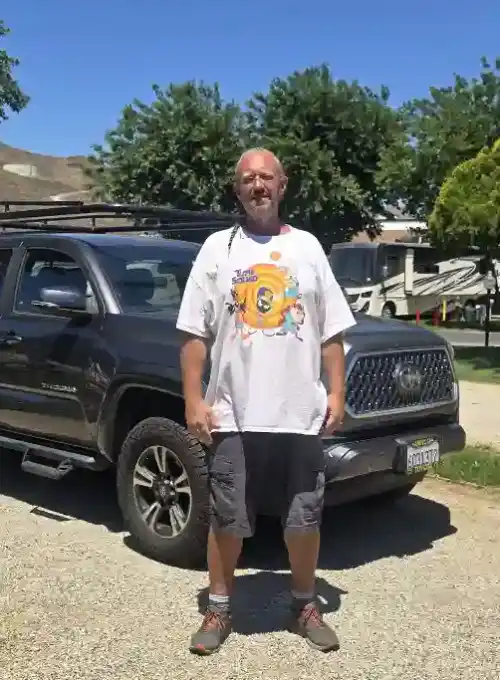 Angelo in front of hie truck