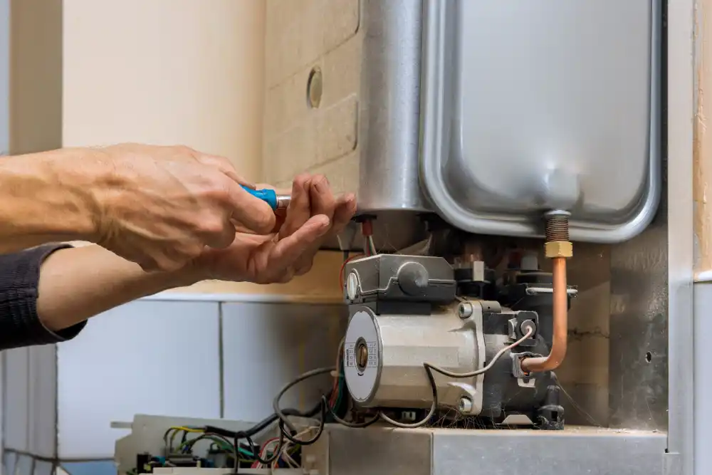 Maintenance on a tankless home water heater.